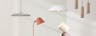 Minimalistische hanglampen in lichtgrijs, wit en verschillende houttinten