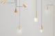 Goudkleurige lampen in minimalistisch design