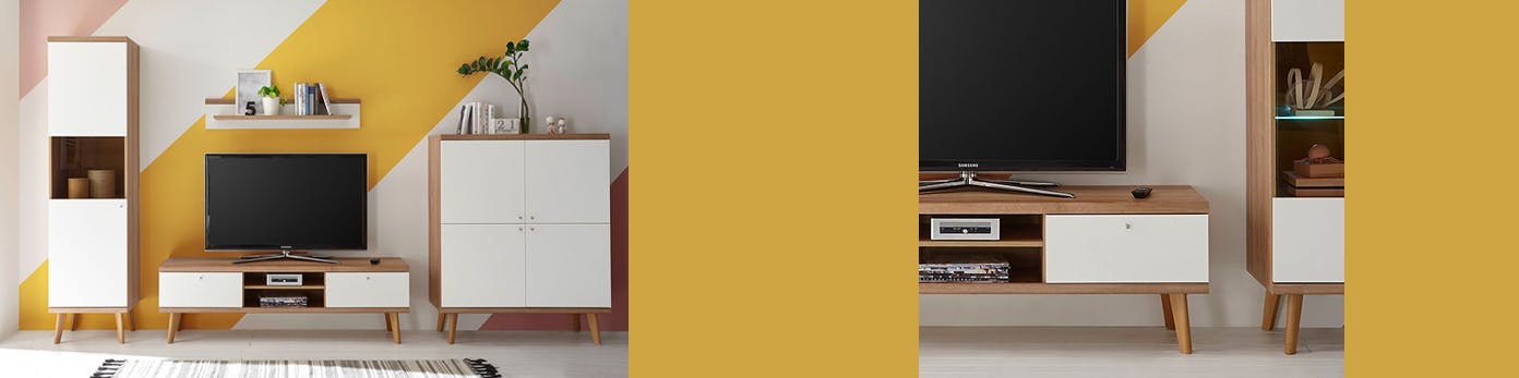 TV-Möbel und Schränke in neutralem Weiß vor Wand mit gelben Farbakzenten