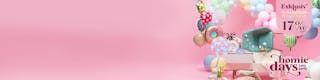 Ein weißes Sideboard mit Deko und einem Polsterstuhl in Mint sowie Vasen, Lampen und Kissen. Dazu ein Lolli und bunte Luftballons, einer davon im Donut-Look, zur Illustration der Homie Days anlässlich des 11. Geburtstags von home24, der im Rahmen einer Candy Party mit Sale-Aktionen und Rabatten gefeiert wird.