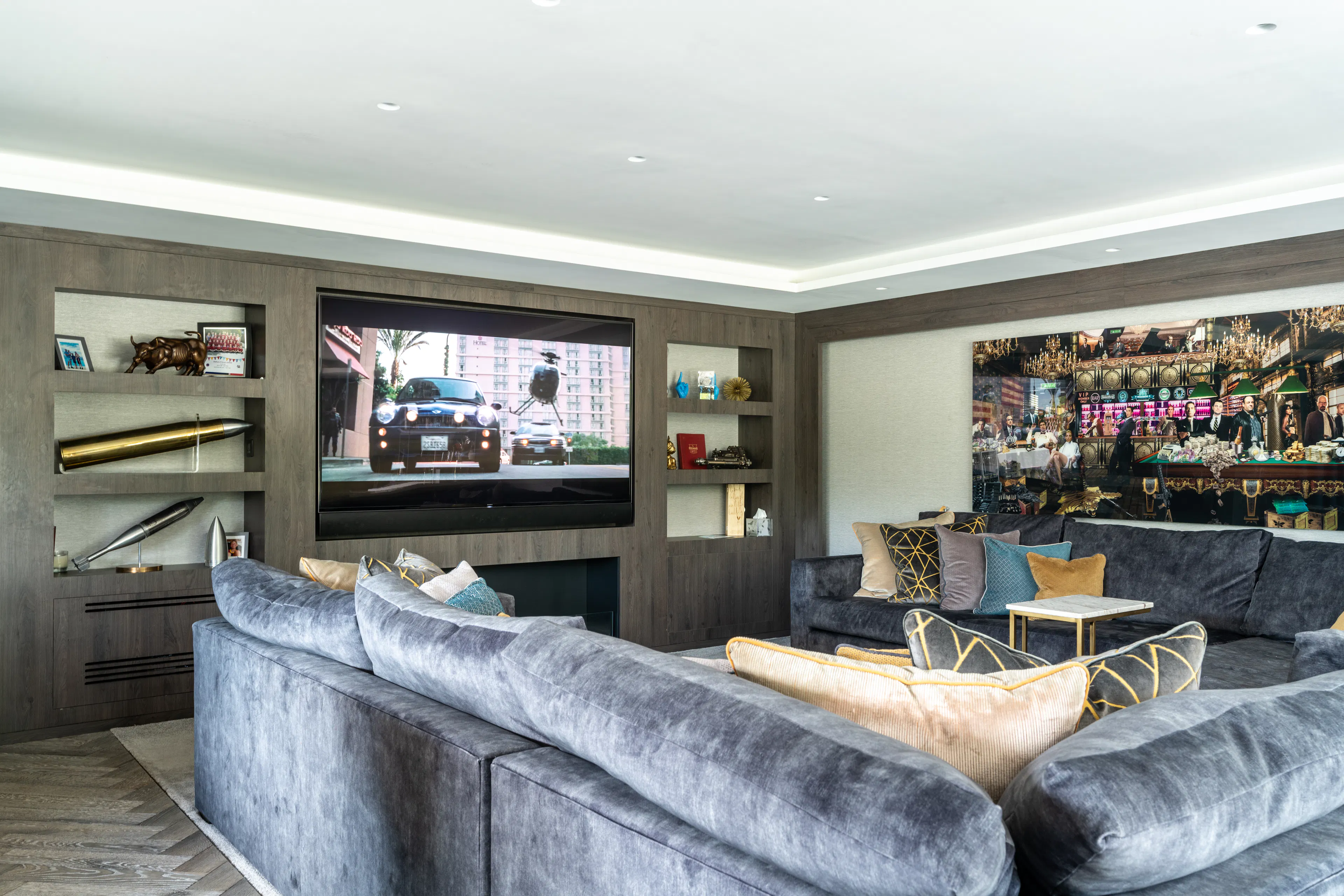 Media room with twin screens set into joinery and cove lighting, Sussex