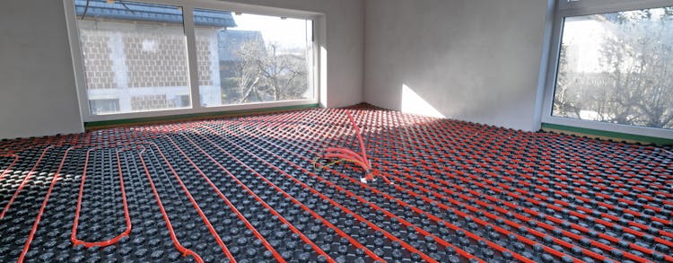 Pose de chauffage au sol avec DEC Energies