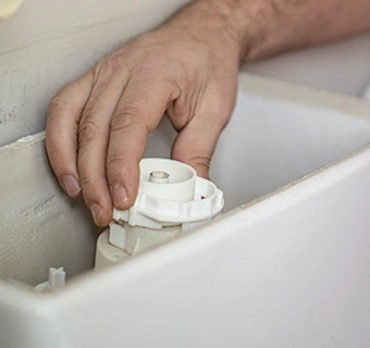 réparation d'un mécanisme de chasse d'eau