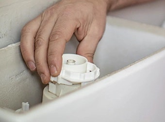 réparation d'un mécanisme de chasse d'eau