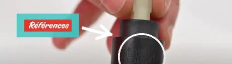 Gros plan sur la référence inscrite au bas d'une cartouche de robinet