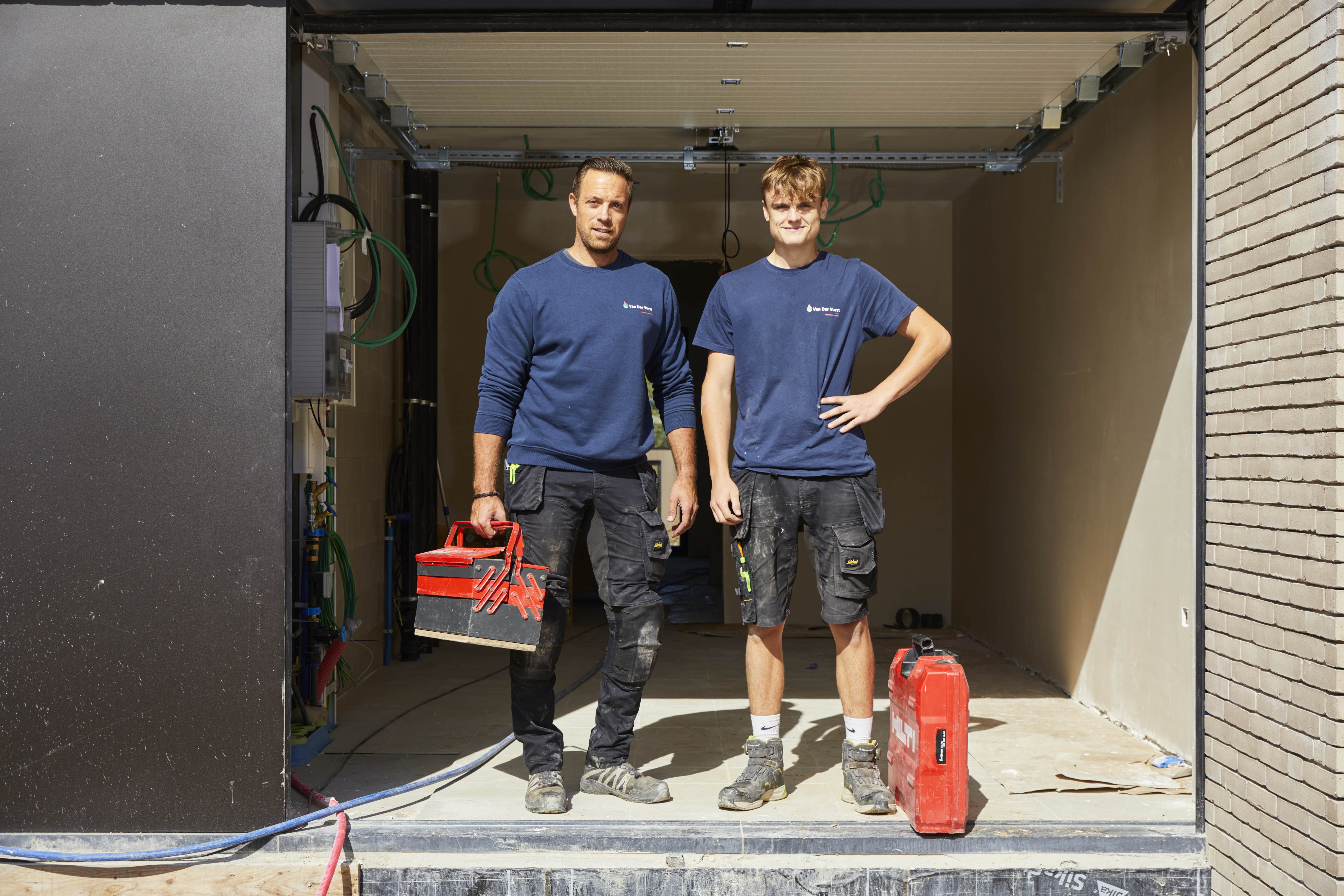 twee medewerkers Van Der Vurst