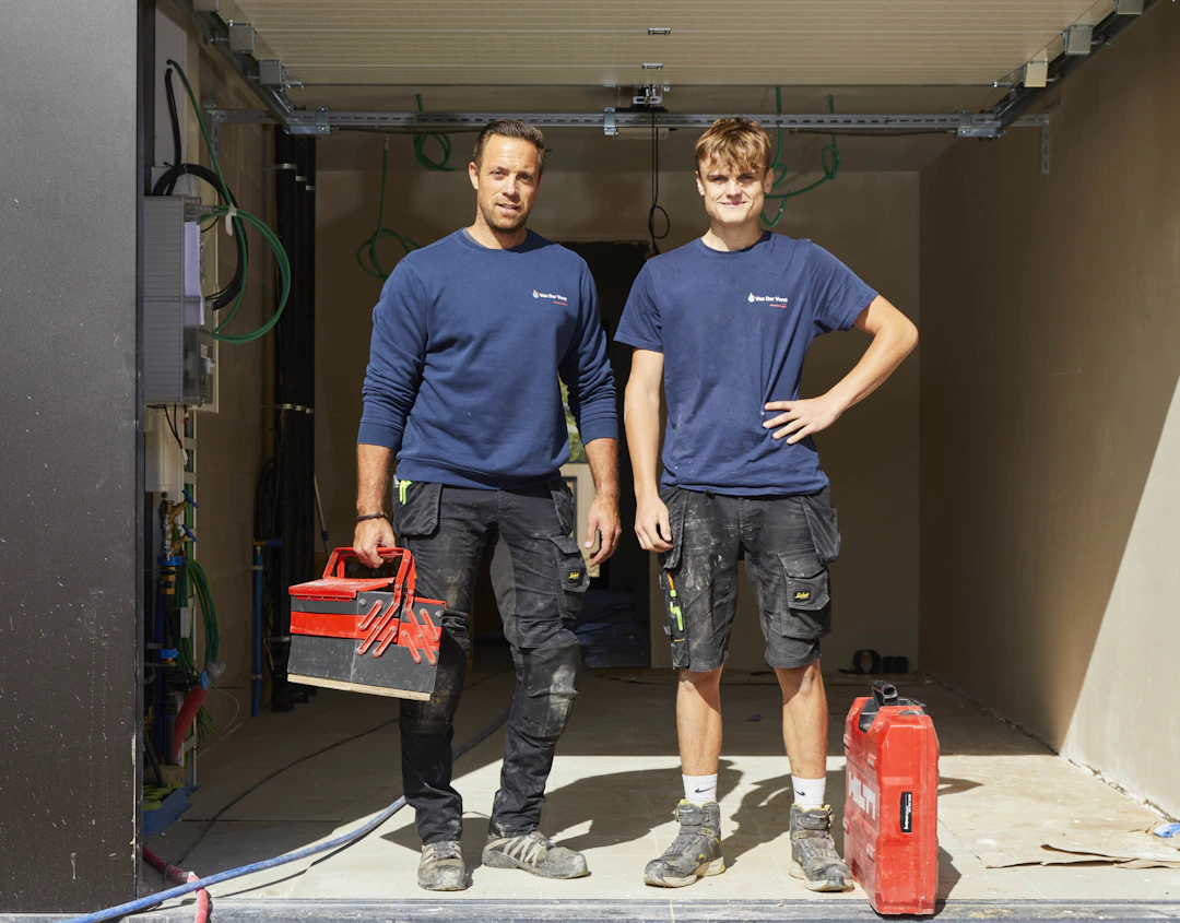 twee medewerkers Van Der Vurst