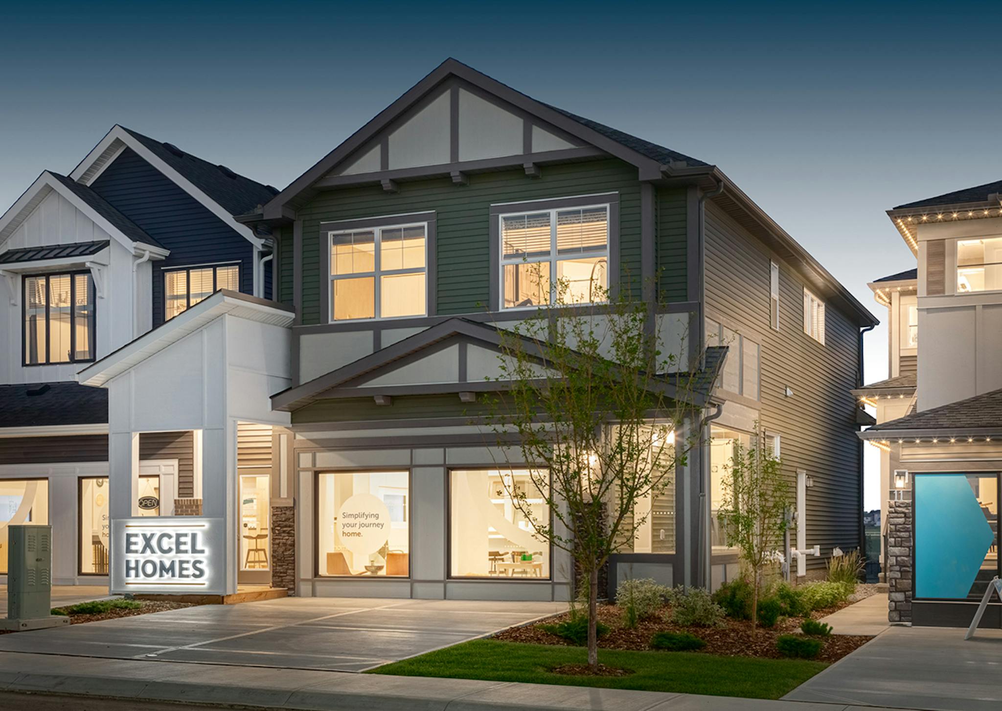 Green and white showhome by Excel Homes