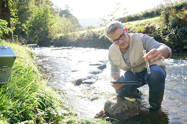 Man Tests for San Antonio Water Quality