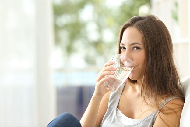 Woman Enjoying Quality Filtered Water