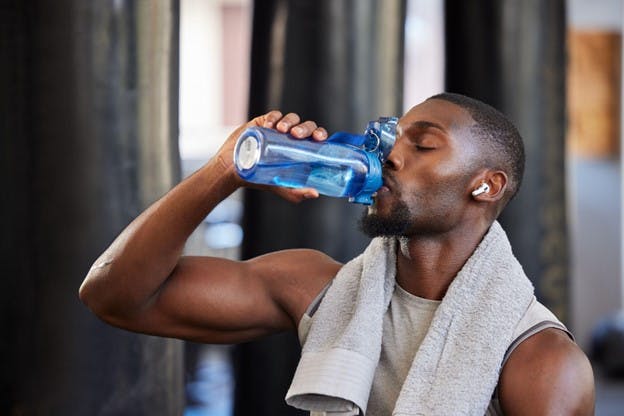 Man Drinks Water to Stay Hydrated