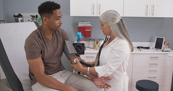 Patient gets Blood Drawn from Doctor