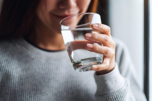 Woman Drinks Water Concern over Arsenicosis Exposure