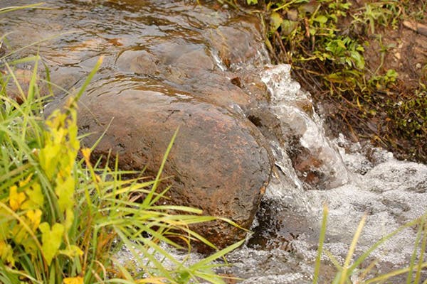 Natural Stream Pouring Over Rocks