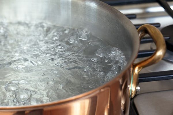 Boiling Water in a Pot on a Stove