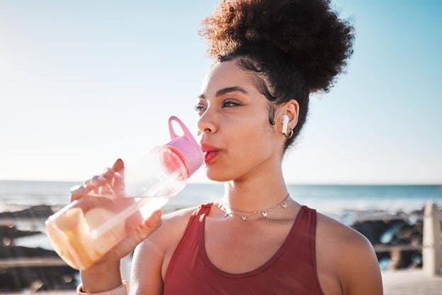Woman Drinking Fresh Miami Florida Water