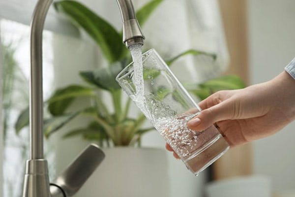 Fresh Water Filter Faucet Woman Gets Glass