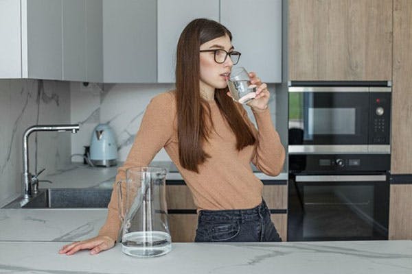 Richmond Water Woman Drinks Fresh Glass