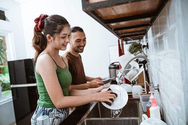 Salem's Tap Water Couple Wash Dishes