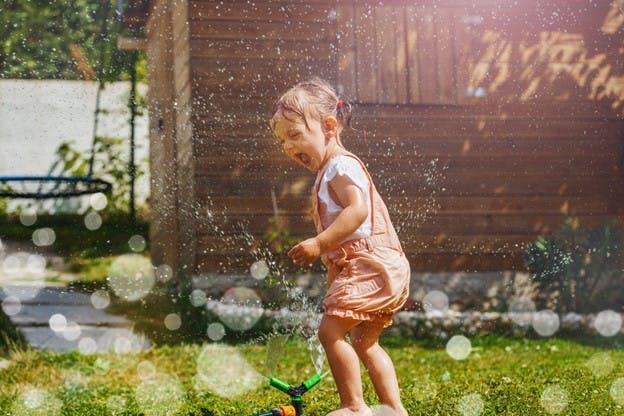 Water Sprinkler Child Happy Playing