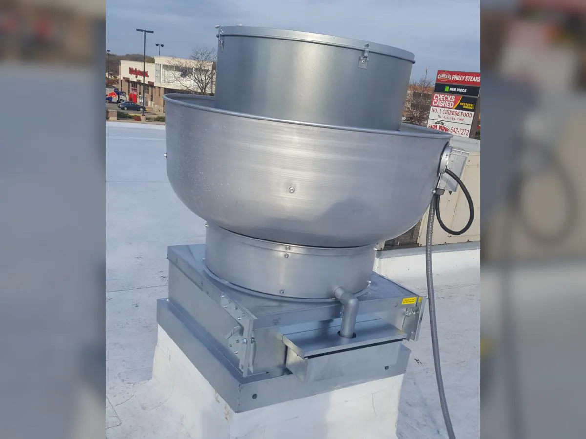 Exhaust hood fan on roof
