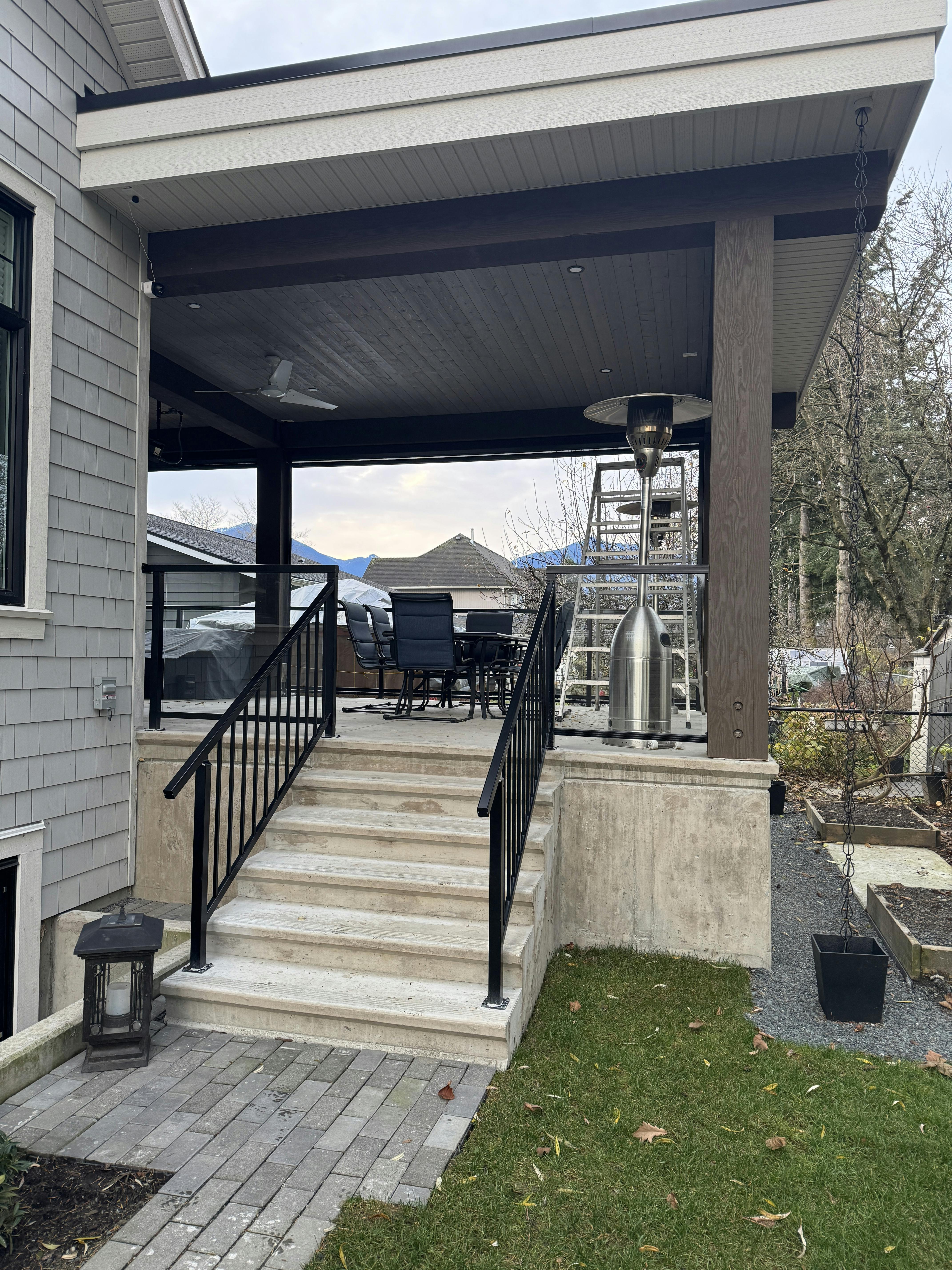Staircase detail of the Centennial outdoor addition project by Hoogendoorn Homes
