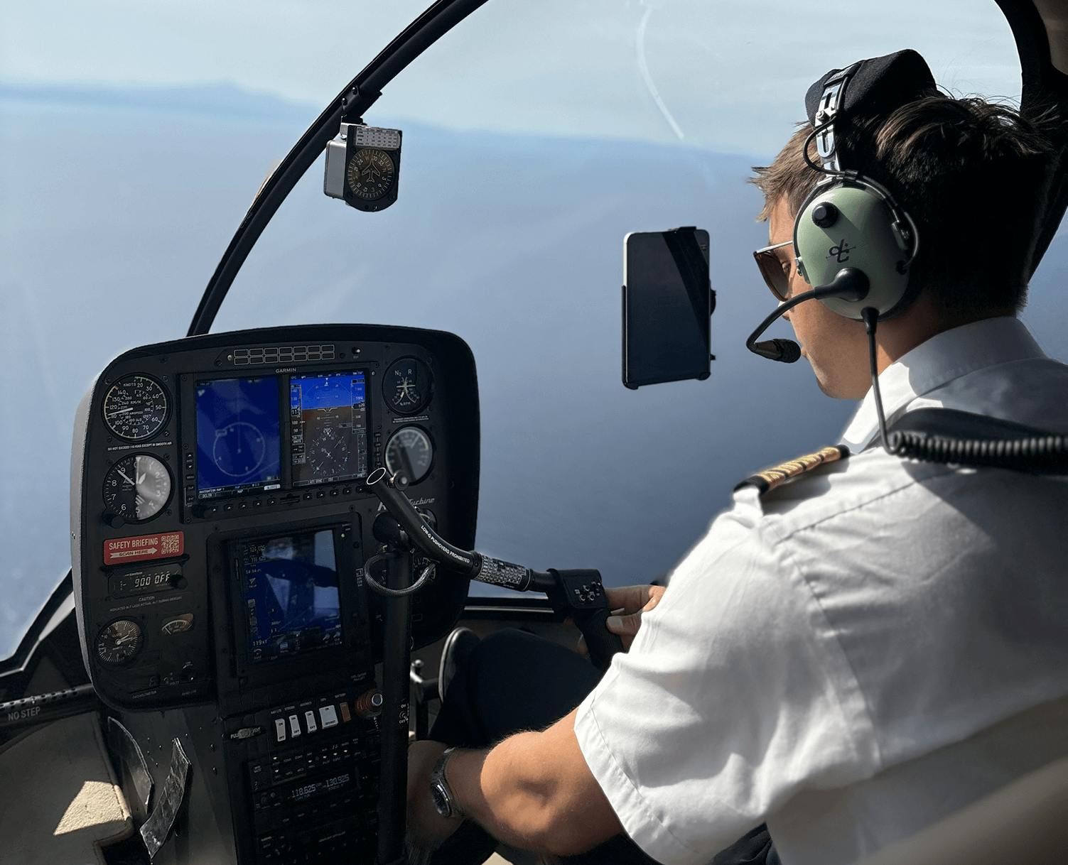 Facts about helicopters – cockpit view showing pilot in flight