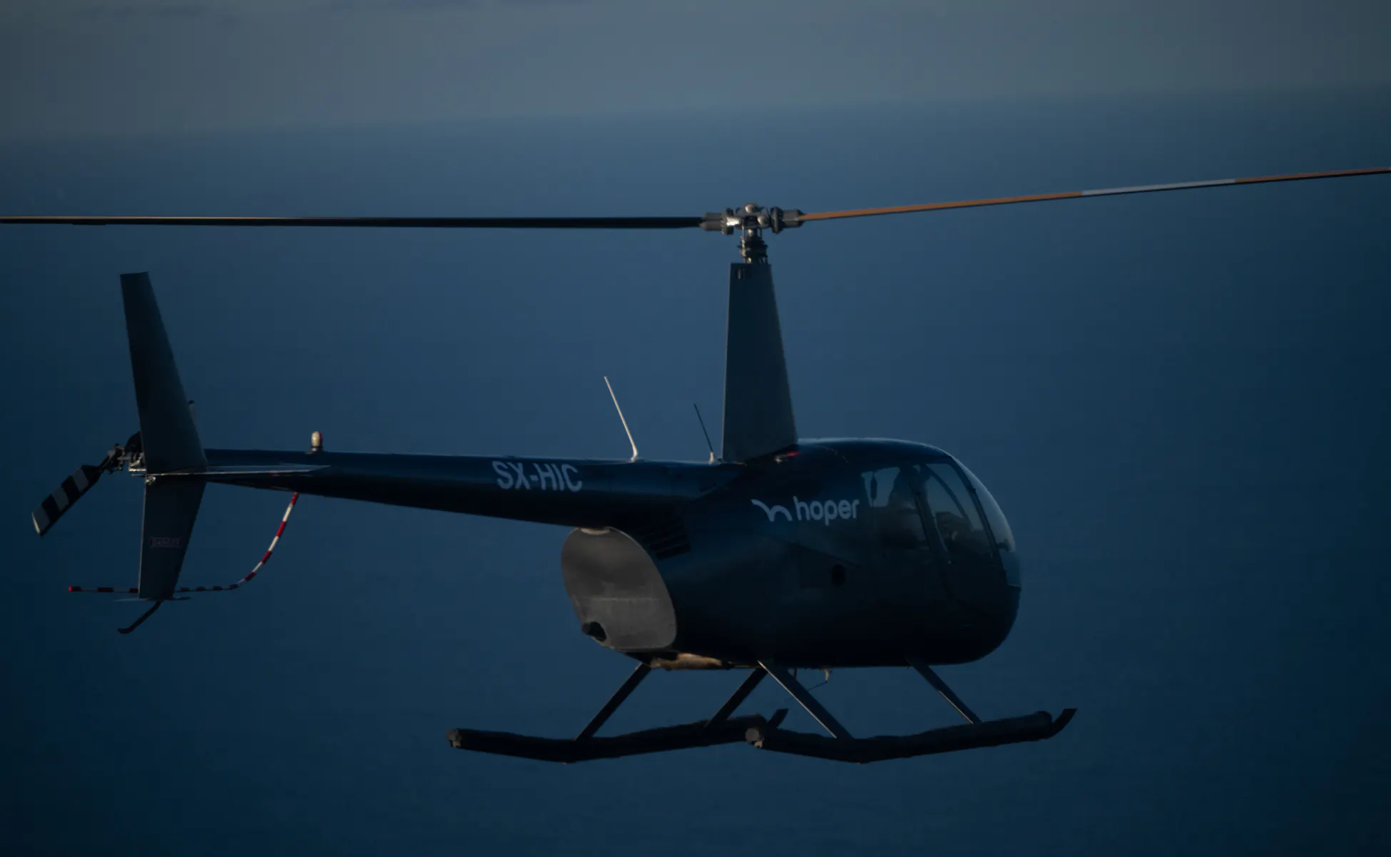 Winter Schedule available - hoper helicopter in the air