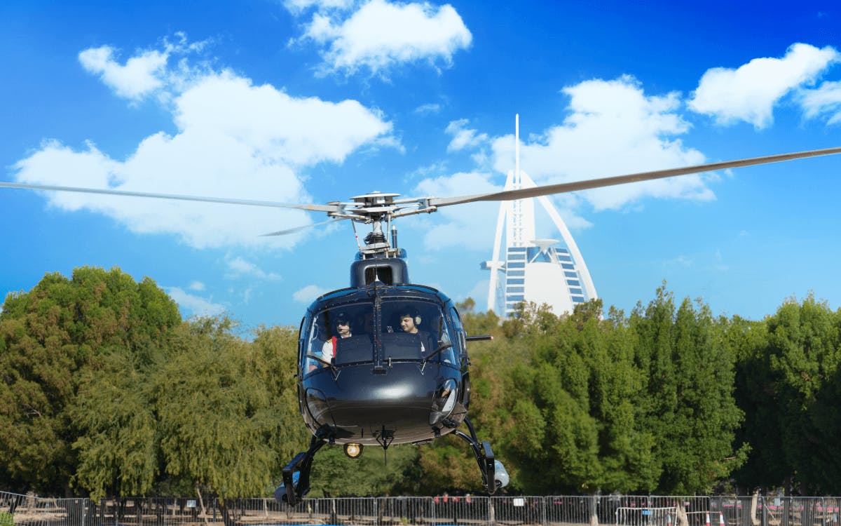 Helicopter taking of with background the Burj al Arab