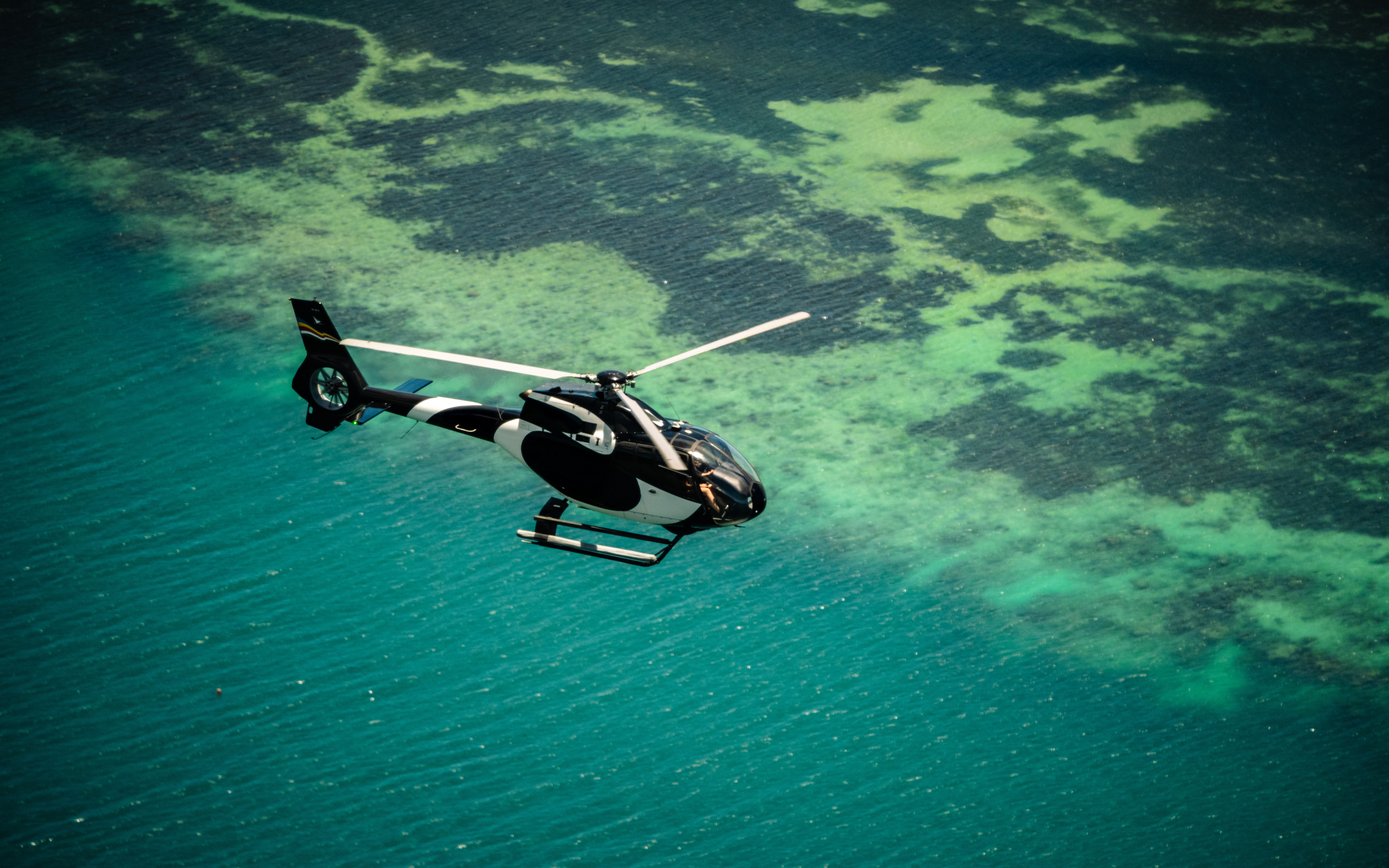 Helicopter over Seychelles Reef