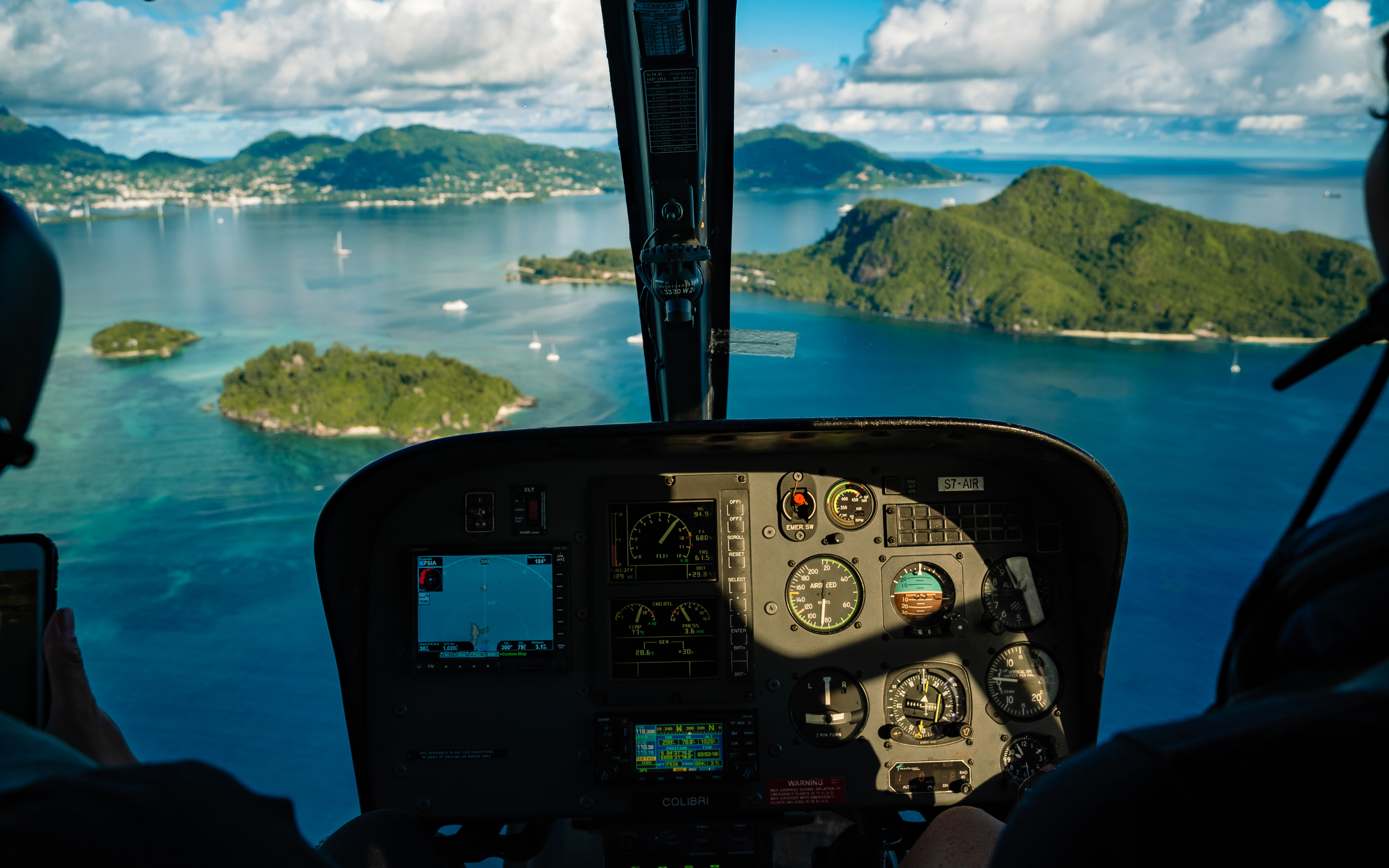 Stunning aerial view of Seychelles from inside a helicopter.