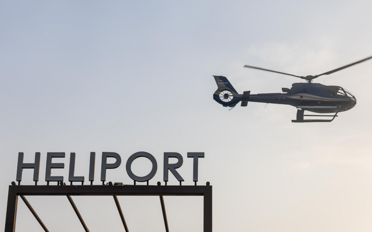 Helicopter Flying above the heliport