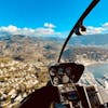 Helicopter flying above Sóller and the Bay