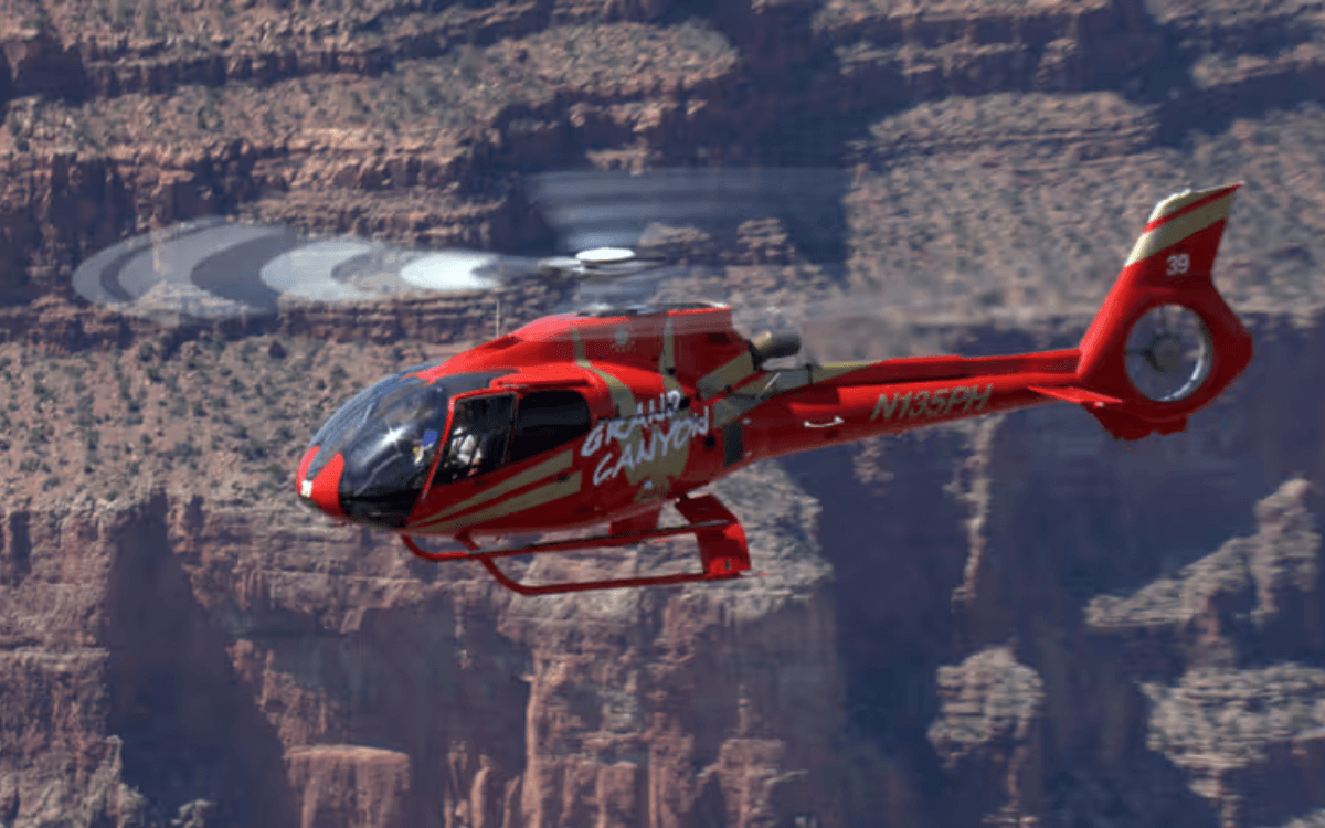 Flying helicopter getting close views of the cliffs in Grand Canyon