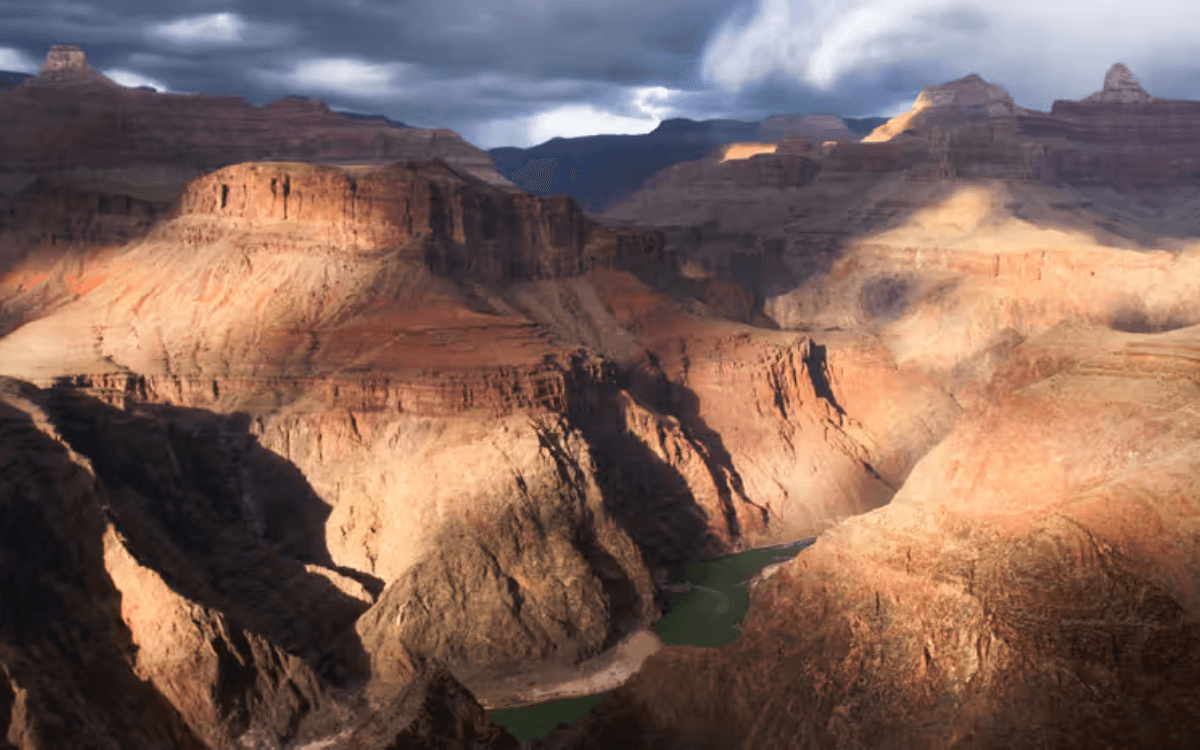 Grand Canyon cliffs with the Colorado River flowing through the canyon