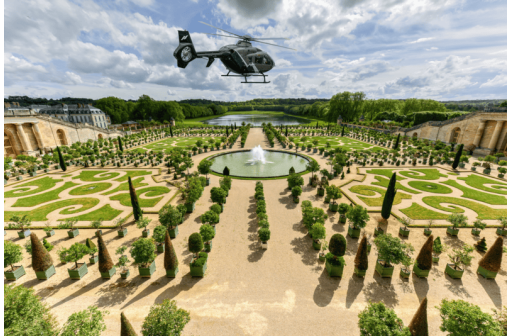 Helicopter flying over Chateau de Versailles