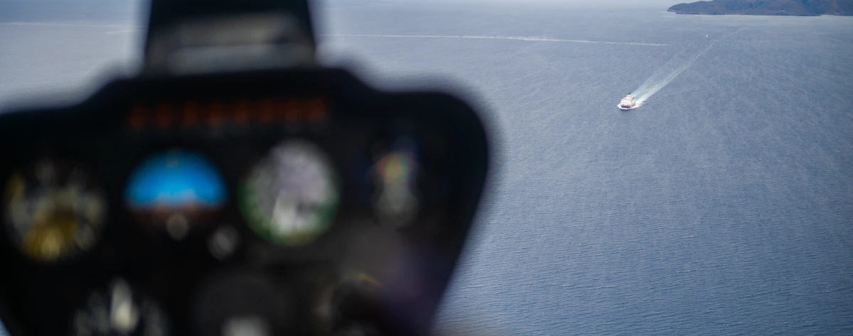 Helicopter flying above the Aegean Islands