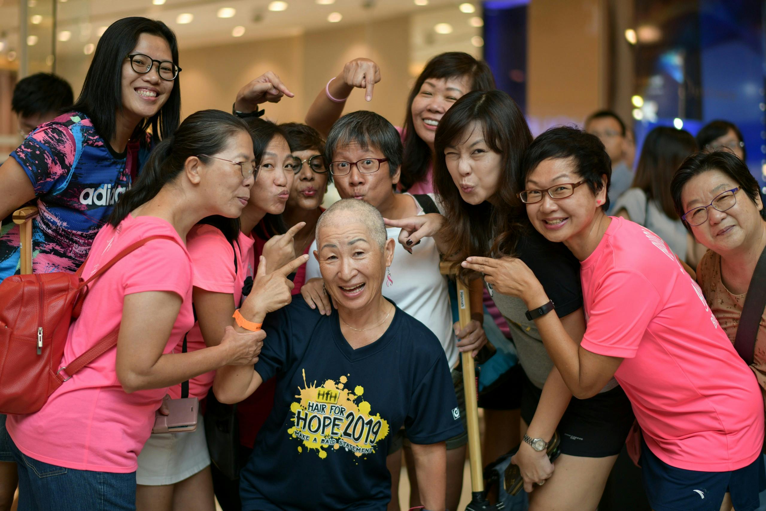 Woman with shaved head for CCF