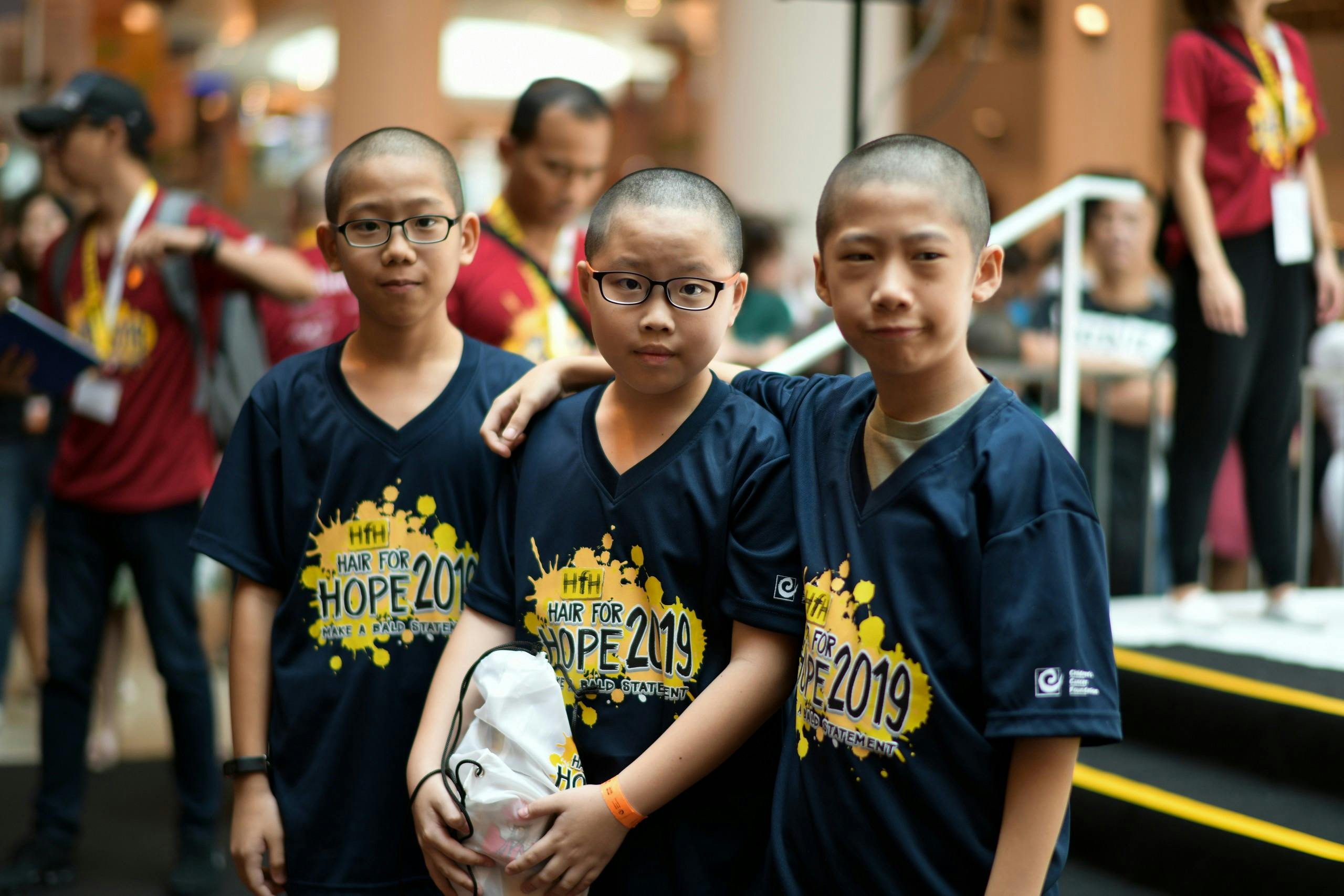 Children with shaved heads for CCF