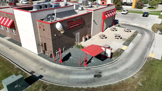 Aerial view of the Freddy's Frozen Custard & Steakburgers restaurant and drive-thru at 2653 45th Street South, Fargo, ND