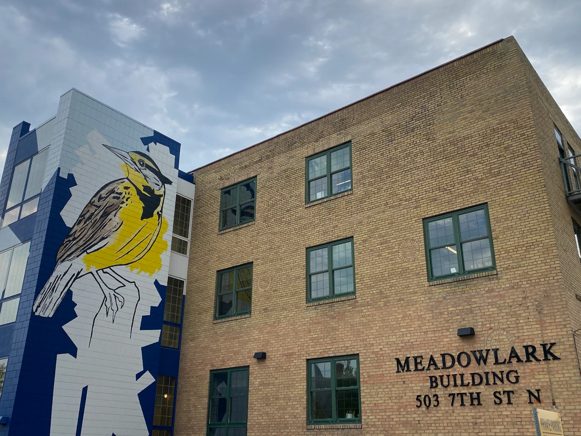 The Meadowlark Building at 503 7th Street North in downtown Fargo, with its meadowlark mural on the stair tower
