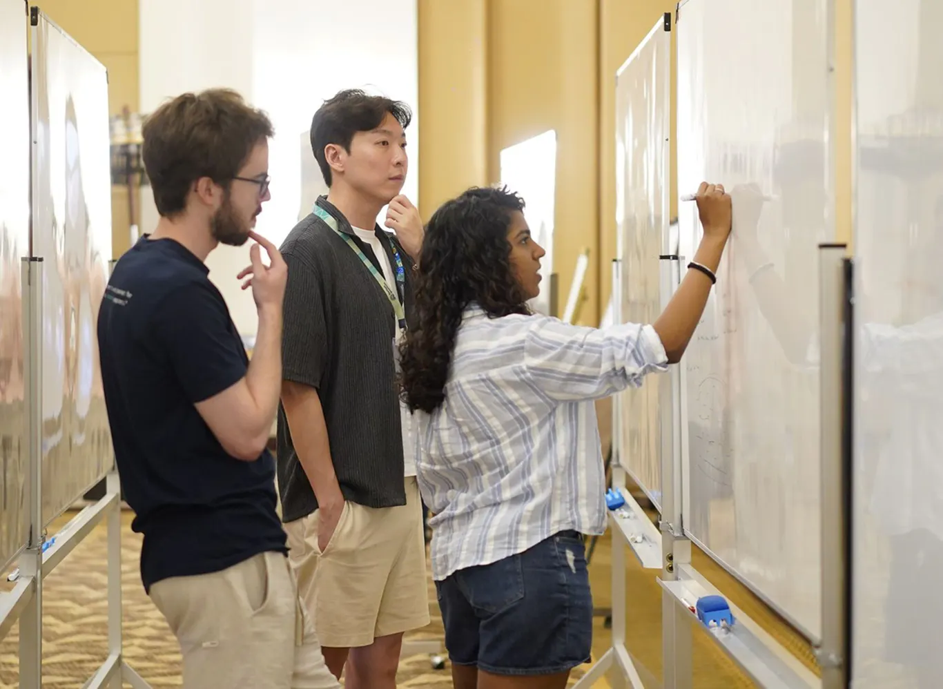 Horizon Quantum's Science team members brainstorming at a whiteboard.