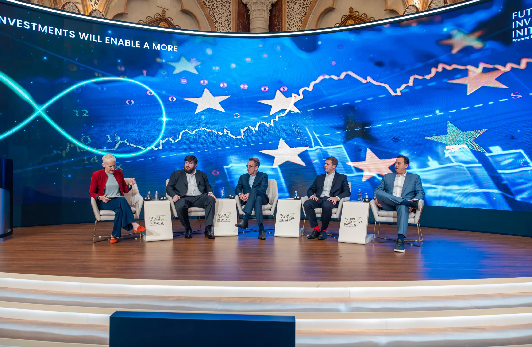 CEO Dr Joe Fitzsimons speaking alongside panelists at FII8 in Riyadh