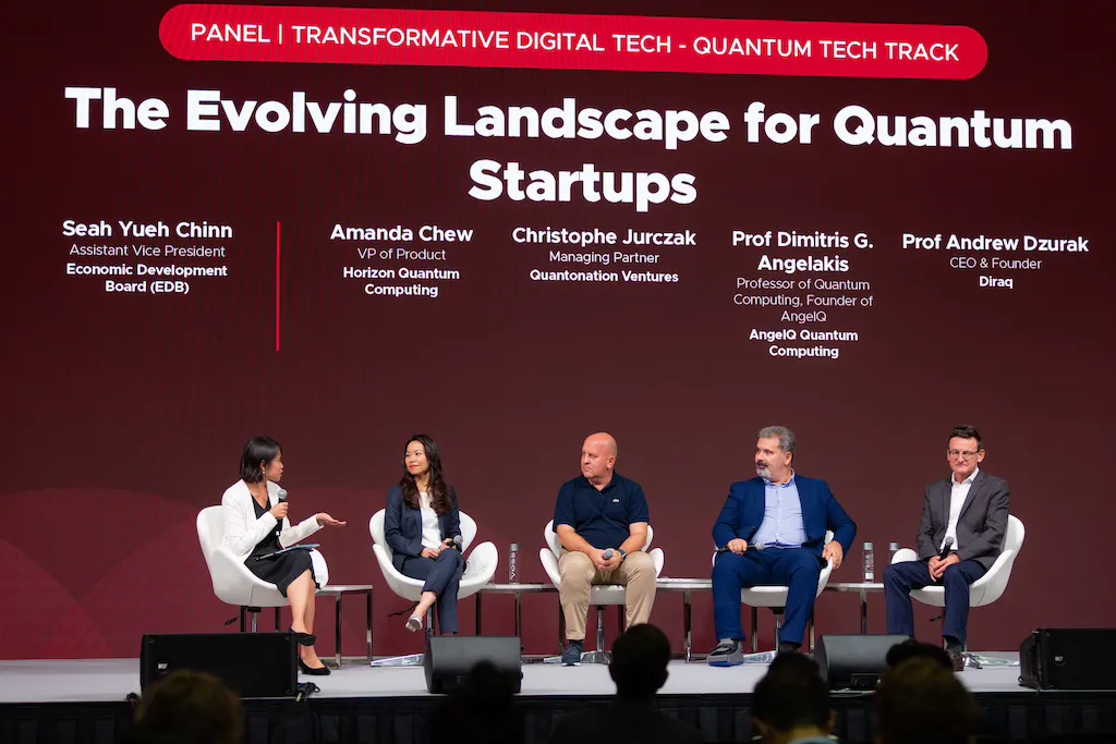 VP of Product Amanda Chew on stage alongside four other panelists