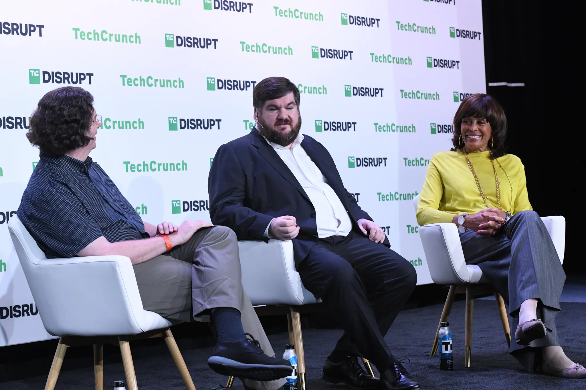 Dr Joe Fitzsimons alongside two other panelists 