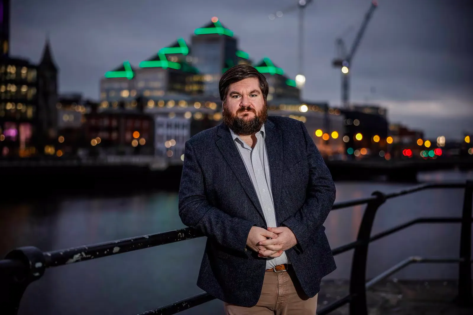 CEO Dr Joe Fitzsimons poses on a bridge that straddles Dublin's Liffey River