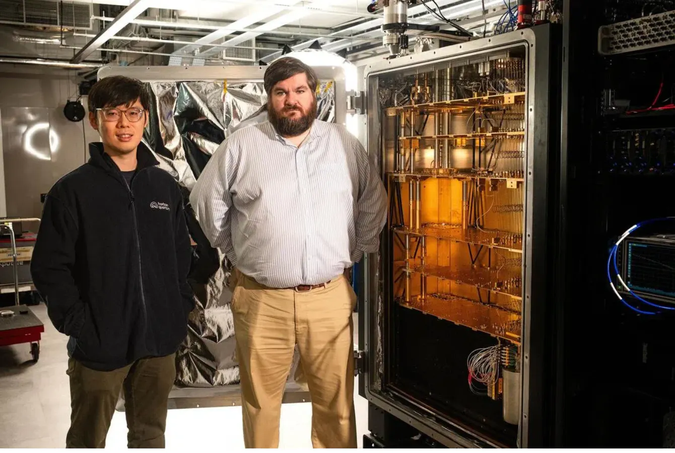Horizon CEO Dr. Joe Fitzsimons and Engineer Kyle Chu with Ember-1 quantum computer