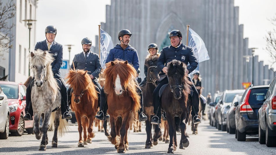 Dagur B. Eggertsson, mayor of Reykjavík, riding an Icelandic horse down the streets of the Icelandic capital alongside other riders
