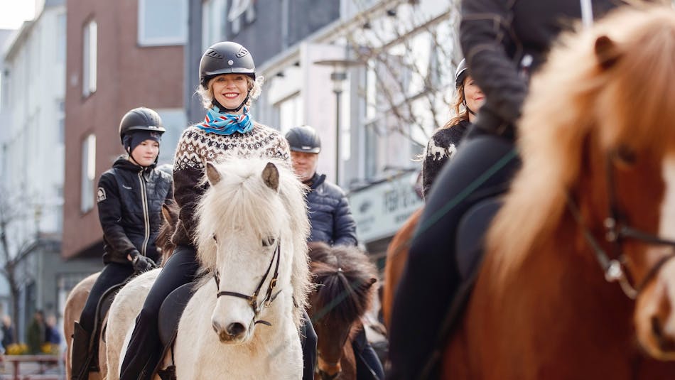 Horse riders parading down the Reykjavík streets.