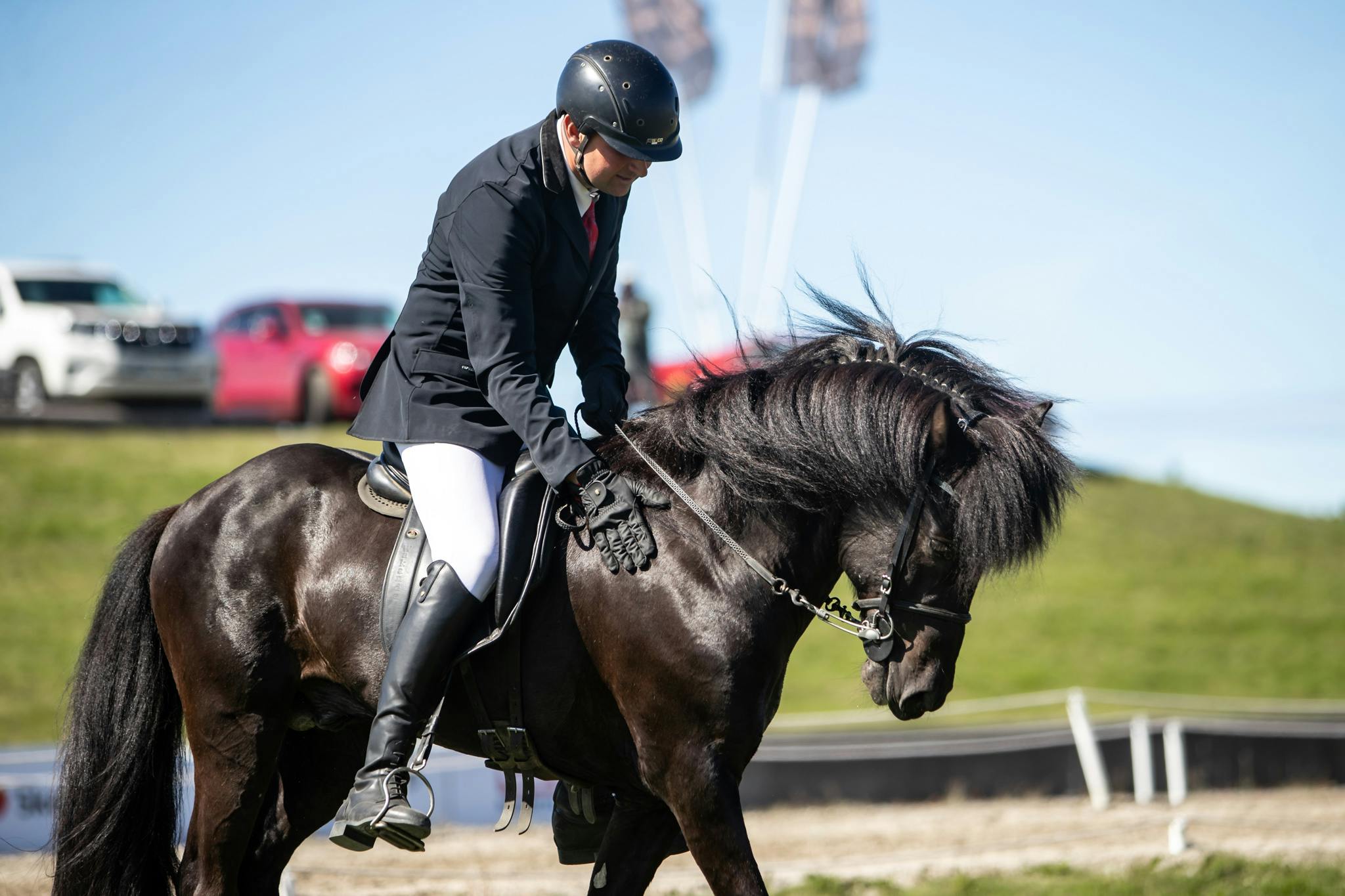 Sigurður Vignir Matthíasson pats Safír frá Mosfellsbæ after winning the B-class